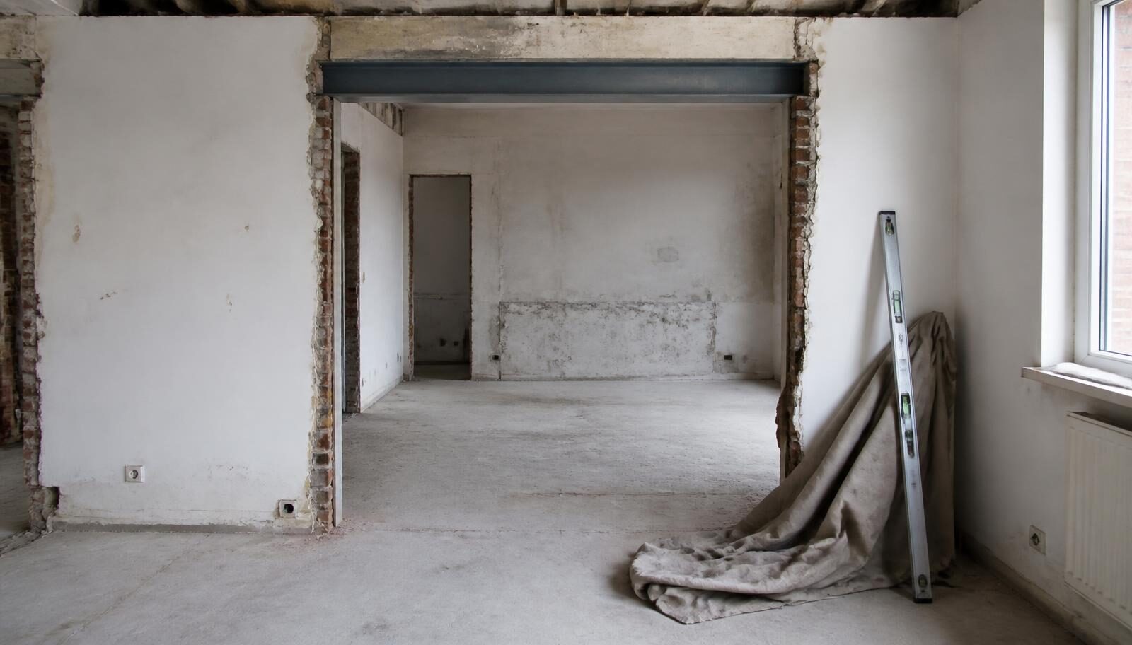 Doorbraak in een draagmuur met stalen balk